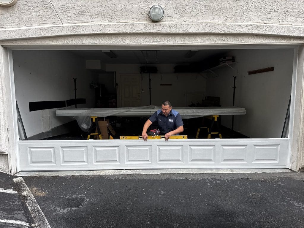 Expert technician executing Garage Door Maintenance
