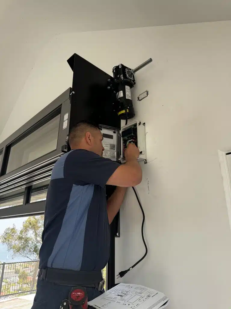 If the lights keep blinking, the door reverses repeatedly, the wiring looks damaged, or safety is a concern, contact a professional.