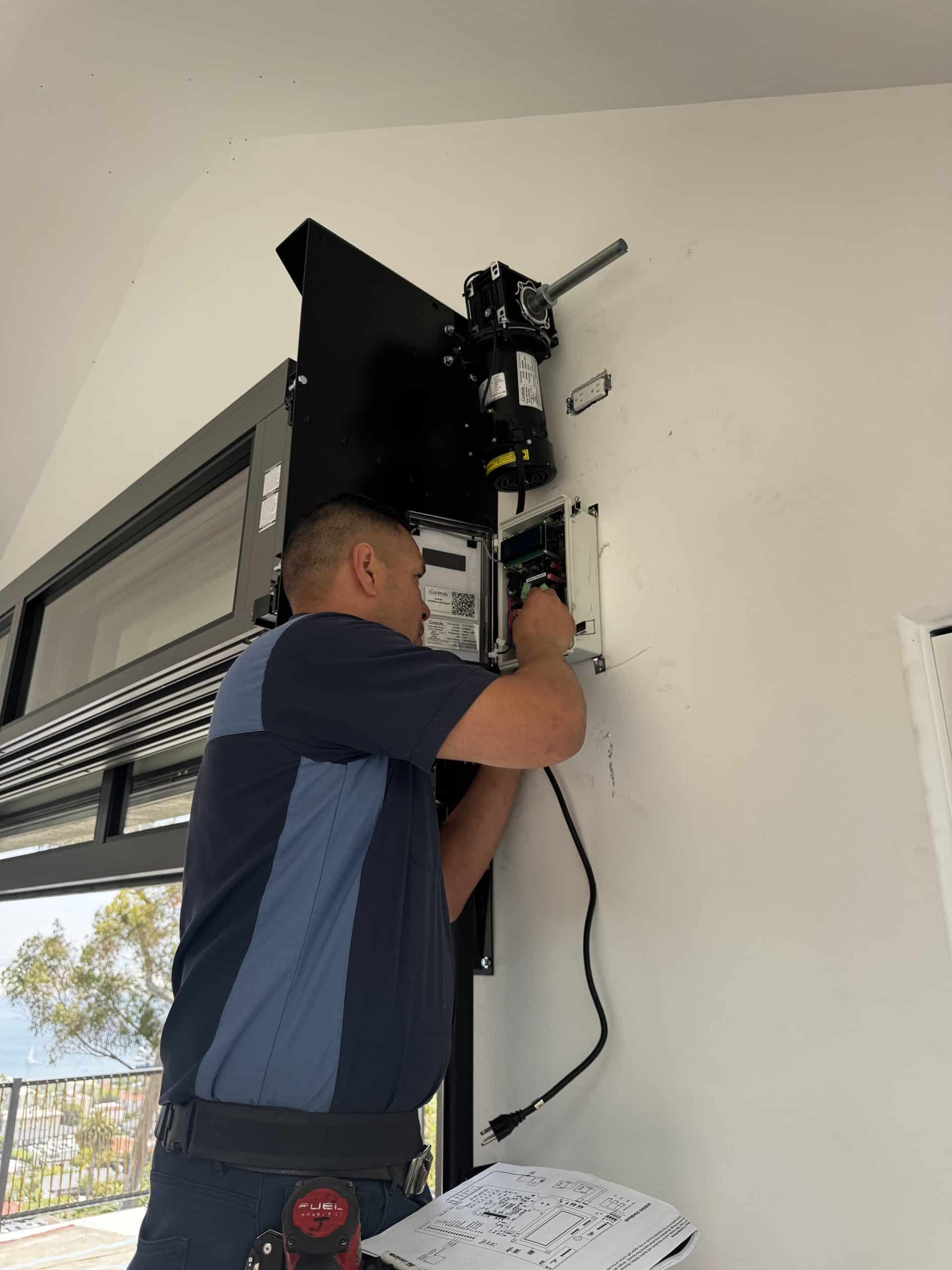 If the lights keep blinking, the door reverses repeatedly, the wiring looks damaged, or safety is a concern, contact a professional.