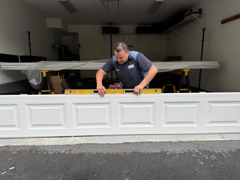 person trying to install garage door