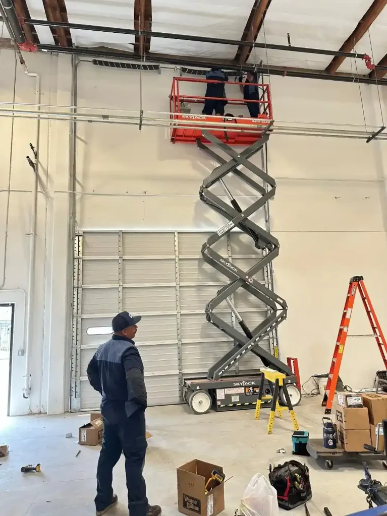 Commercial Garage Door Repair - Scissor Lift with Techs (1)